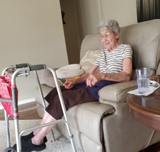 Cindy's mother seated at home
